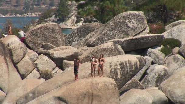 People on rocks at Lake Tahoe — Stock Video