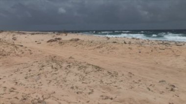 North Shore Aruba üzerinde kumullar ile