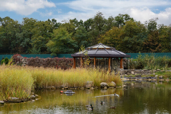 Mezhyhirya National Park, Novi Petrivtsi, Kyiv region, Ukraine - October, 16, 2020: Museum of Corruption. The large natural complex Mezhyhirya Residence with a beautiful garden, a cascade of lakes.