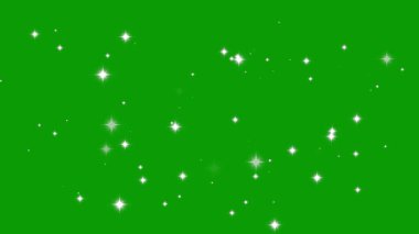 Animasyon parıltısı yeşil ekran arka planında parıldıyor. Beyaz toz ışığı, parlayan yıldızlar ve görsel örtüler için bokeh ışığı efektleri var..