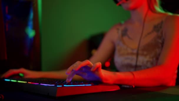 Two Pretty Gamer Girls Playing an Online Game in the Dark Neon Gaming Club,  Lifestyle Stock Footage ft. cellular & clothes - Envato Elements