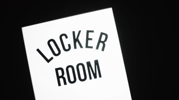 A door to the changing room in the gym — Stock Video