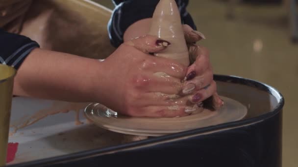 Pottery crafting - forming a wet clay in longer shape — Stock Video