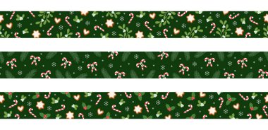 Koyu yeşil arka planda Noel aralıksız şeker kamışı, zencefilli kurabiye, ökseotu, çoban püskülü ve köknar dalları. Kartlar ve davetiyeler için kusursuz dekoratif tatil arkaplanları.