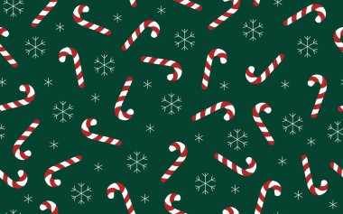 Şeker kamışları ve kar taneleri pürüzsüz desen. Kar ve şekerlemelerle dolu yeşil arka plan. Tatil tasarımı.