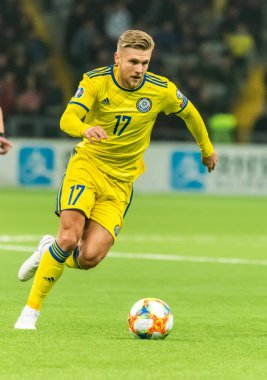 Nur-Sultan, Kazakistan - 24 Mart 2019. Kazakistan Millî Futbol Takımı orta saha oyuncusu Alexander Merkel UEFA Euro 2020 ön eleme karşılaşmasında Rusya 'ya karşı Kazakistan (0-4) Nur-Sultan maçında.