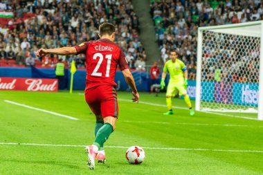 Kazan, Russia - June 28, 2017. Portugal national football team right back Cedric Soares launching an attack during FIFA Confederations Cup 2017 semi-final Portugal vs Chile. clipart