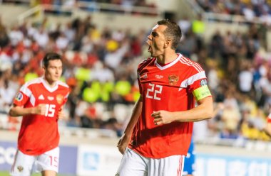 Lefkoşe, Kıbrıs - 13 Ekim 2019. Rusya milli futbol takımı forveti Artem Dzyuba, Lefkoşe 'de oynanan UEFA Euro 2020 ön eleme karşılaşmasında attığı golü kutluyor..