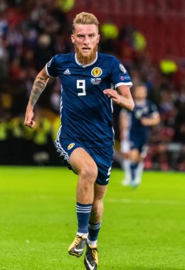 Glasgow, İskoçya, İngiltere - 6 Eylül 2019. İskoçya Millî Futbol Takımı forveti Oliver McBurnie UEFA Euro 2020 ön eleme maçı sırasında Glasgow 'da İskoçya Rusya' ya karşı.