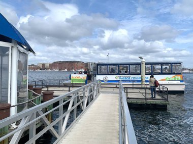 Baltimore, Maryland, USA  September 17, 2024: Pier to access the The Harbor Connector. It is a free maritime transit service. Getting around the waterfront by vessel for transport or sightseeing