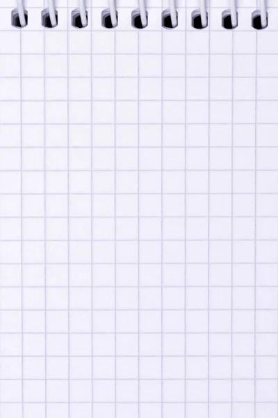 Kare kağıt ile boş sarmal ilişkili Not defterini açın, yakın çekim