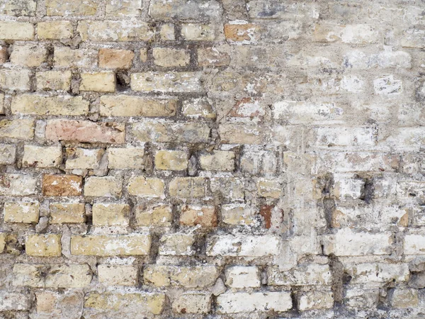 Antigua pared de ladrillo rústico dañado con fondo de textura de yeso — Foto de Stock