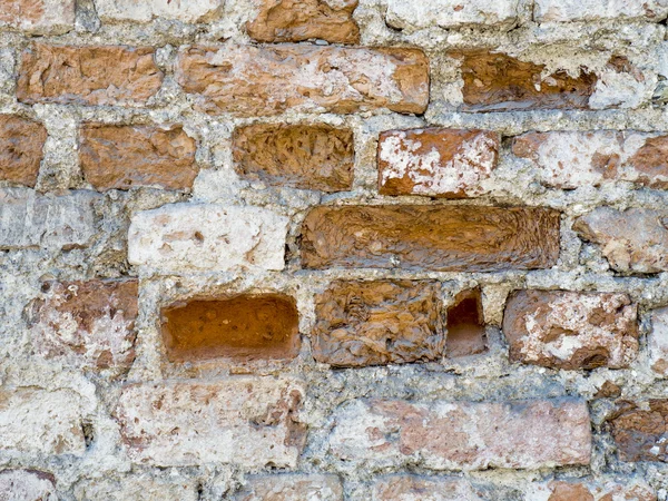 Vintage grunge desigual pared de ladrillo rojo con espolvoreado fondo de textura de yeso blanco — Foto de Stock