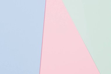 Soyut renkli kağıt dokusu arkaplanı. Minimum geometrik şekiller ve çizgiler mavi, açık yeşil, pastel pembe renkler
