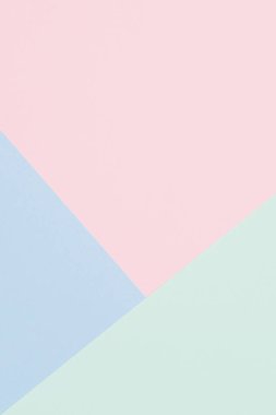 Soyut renkli kağıt dokusu arkaplanı. Açık mavi, pastel pembe ve yeşil renkte en az geometrik şekil ve çizgiler