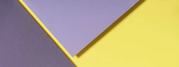 Fondo de papel geométrico abstracto en colores amarillo y gris. Iluminante de moda amarillo y último fondo de colores grises — Foto de Stock