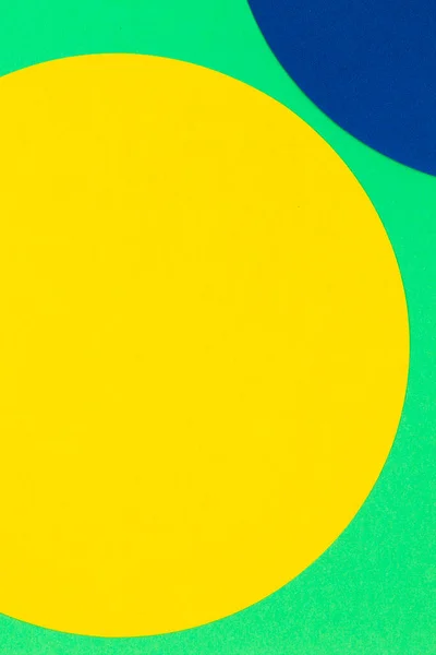 Αφηρημένο χρώμα χαρτί υφή φόντο. Πολύχρωμο στρογγυλό σχήμα τριγωνικό σχήμα γεωμετρία σε ανοιχτό πράσινο φόντο — Φωτογραφία Αρχείου