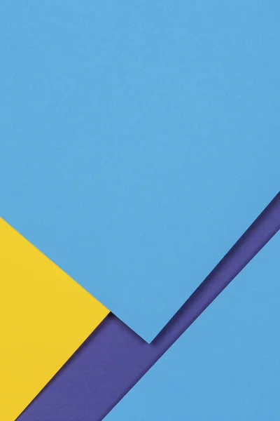 Δημιουργικό αφηρημένο μπλε και κίτρινο χρώμα γεωμετρικό χαρτί συνθετικού φόντου, top view — Φωτογραφία Αρχείου