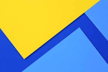 Yaratıcı soyut mavi ve sarı renkli geometrik kağıt kompoziton arkaplan, üst görünüm