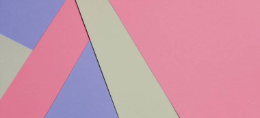 Soyut renkli kağıt dokusu arkaplanı. Açık mavi, pastel pembe ve yeşil renkte en az geometrik şekil ve çizgiler