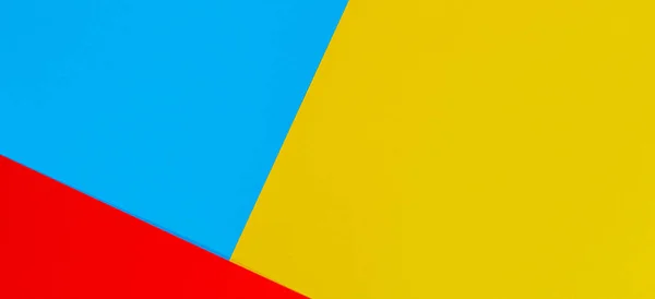 Χρώμα χαρτιού γεωμετρία επίπεδη σύνθεση banner φόντο με κίτρινο κόκκινο και μπλε τόνους — Φωτογραφία Αρχείου