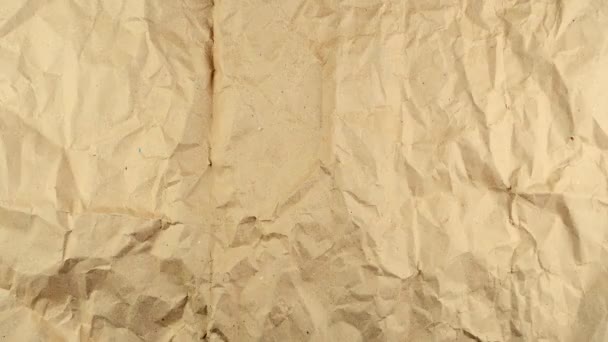 Detener el movimiento de fondo de textura de papel arrugado marrón — Vídeos de Stock