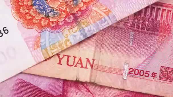 Stop motion animation of Chinas currency Yuan notes. Chinese money banknotes. Top view. 4k video — Stock Video