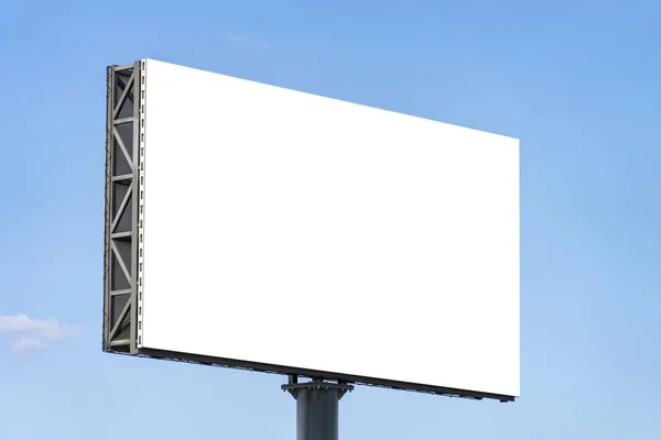 Blank big billboard against blue sky background. White horizontal board mock up for advertising, marketing, information Stock Image