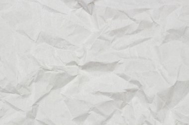 Açık gri buruşuk ambalaj kağıdı arkaplanı, üst görünüm