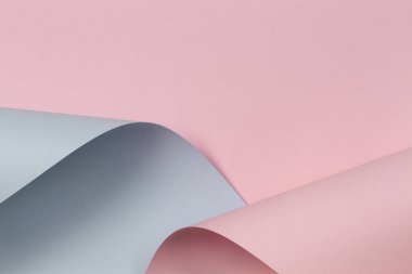 Soyut geometrik şekil pastel pembe ve mavi renkli kağıt arka plan