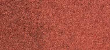 Spor ve çocukların oyun parkları için kırmızı koruyucu kaplama. Doku arkaplanı