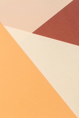 Toprak tonlarında soyut geometrik kağıt arka plan. Bej, sarı, mercan, kahverengi arkaplan.