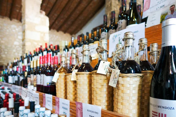 Xalo, Spain - December 18, 2020: Wine bottles in small old wine winery store, Spain — 图库照片