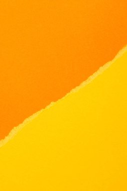 Yırtık grunge sarı ve turuncu geometrik kağıt arka plan. Renkli yırtık kağıt kolajı duvar kağıdı