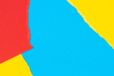 Yırtık grunge sarı, mavi, kırmızı geometrik kağıt arka plan. Renkli yırtık kağıt kolajı duvar kağıdı