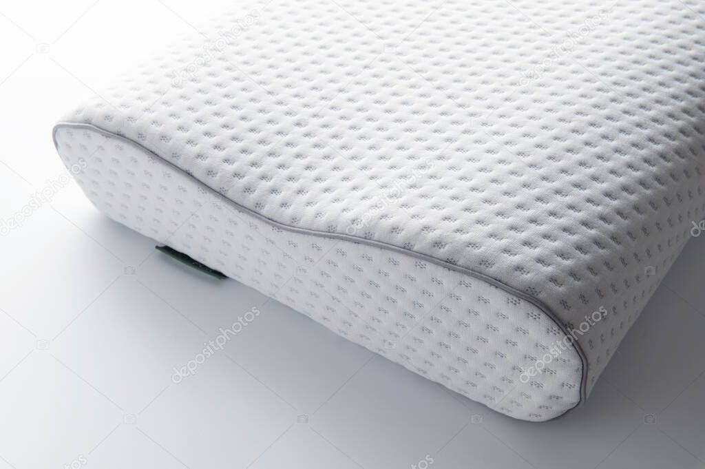 memory foam orthopedic pillow, on a white background
