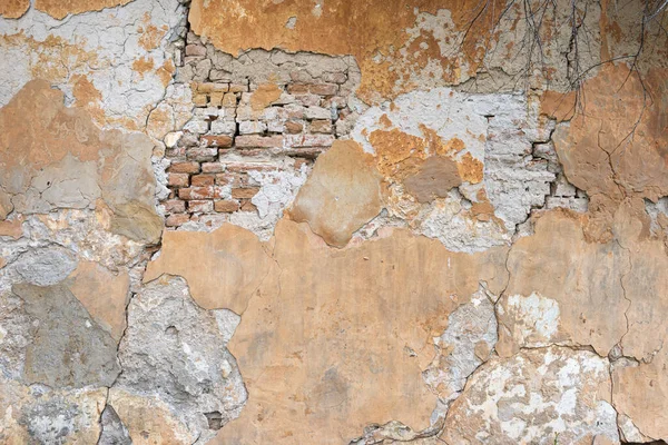 Abblätternde Wandstruktur Mit Freiliegendem Ziegelmauerwerk — Stockfoto