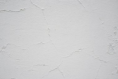 texture of old peeling white wall, cracks, vintage plaster