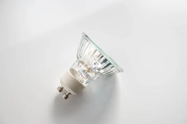 halogen lamp with pin base, energy, light, energy saving, white background, empty space for text