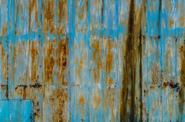 Eski paslı mavimsi demir duvar arka plan