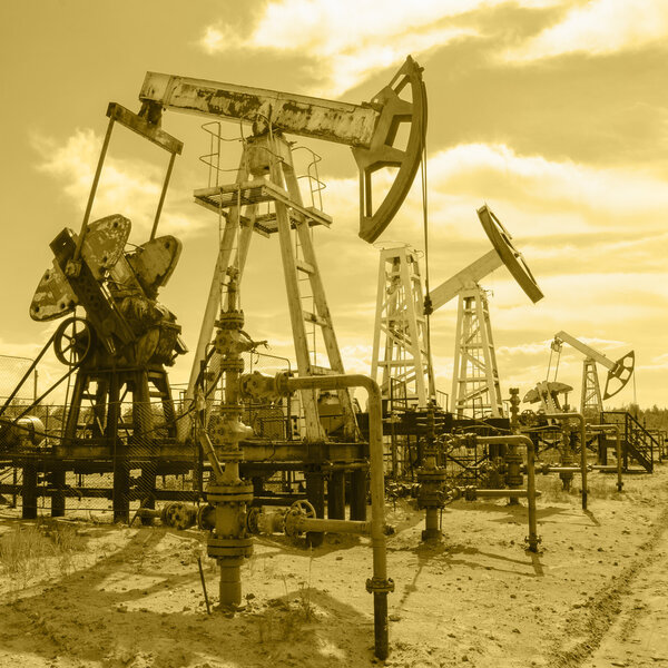 Pump jack and wellhead in the oilfield.