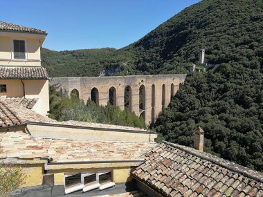 Spoleto, Umbria, Italy - 11 September 2019: Ponte delle Torri from via Gattaponi clipart