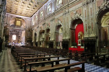 Naples, Campania, Italy - February 26, 2021: Interior of the seventeenth-century Basilica Santuario del Carmine Maggiore clipart