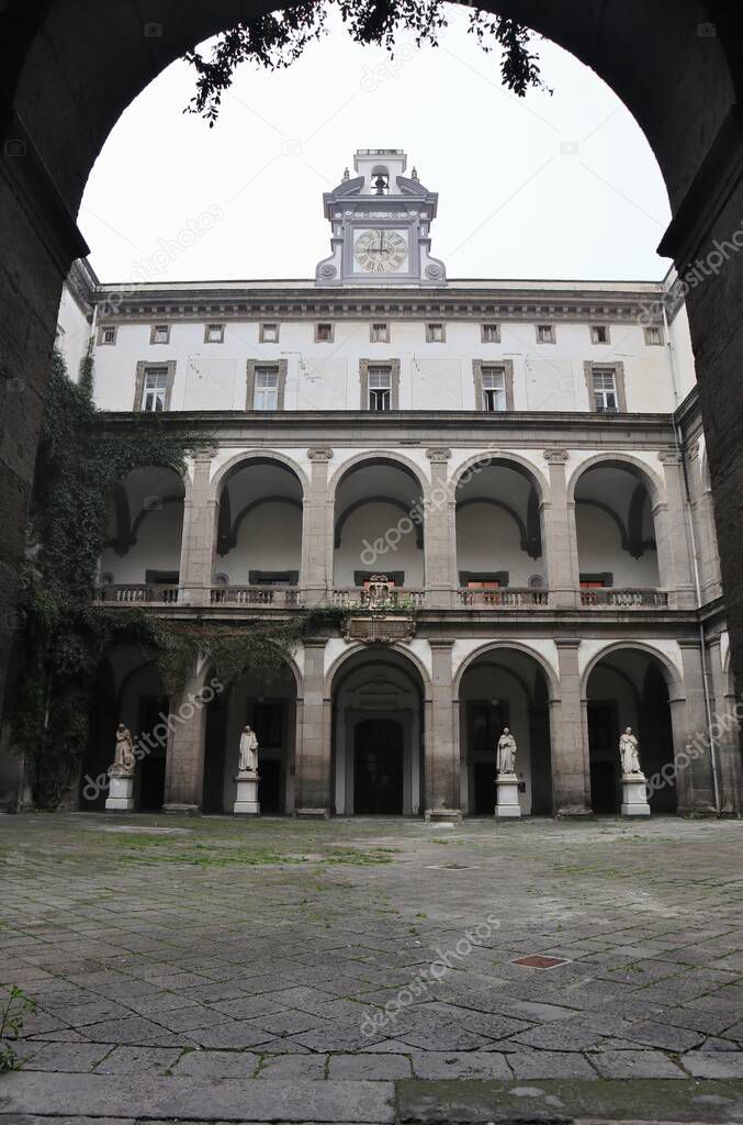 Naples, Campania, Italy - February 26, 2021: Chiostro del Salvatore, or Courtyard of the Statues, of the monumental complex of Ges Vecchio in Via Palladino which houses several departments of the Federico II University