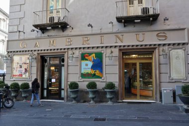 Naples, Campania, Italy - February 16, 2021: Historic premises of the Gran Caff Gambrinus where the practice of Caff Sospeso was born at the end of the nineteenth century clipart