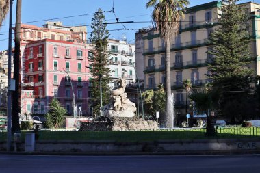 Naples, Campania, Italy - January 26, 2021: Nineteenth-century fountain of the Mermaid Partenope in Piazza Sannazzaro clipart
