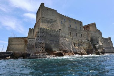 Naples, Campania, Italy - May 14, 2021: Panoramic view of Castel dell'Ovo from the boat