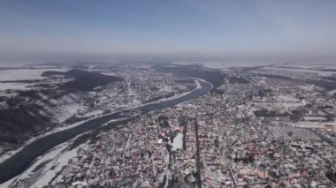 Aerial Panorama of a Small Town and Canyon at Winter Day