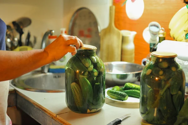 People are preparing in the kitchen. pickling cucumbers, preparation for winter salting. — Stock Photo, Image