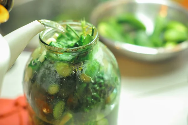 People are preparing in the kitchen. pickling cucumbers, preparation for winter salting. — Stock Photo, Image